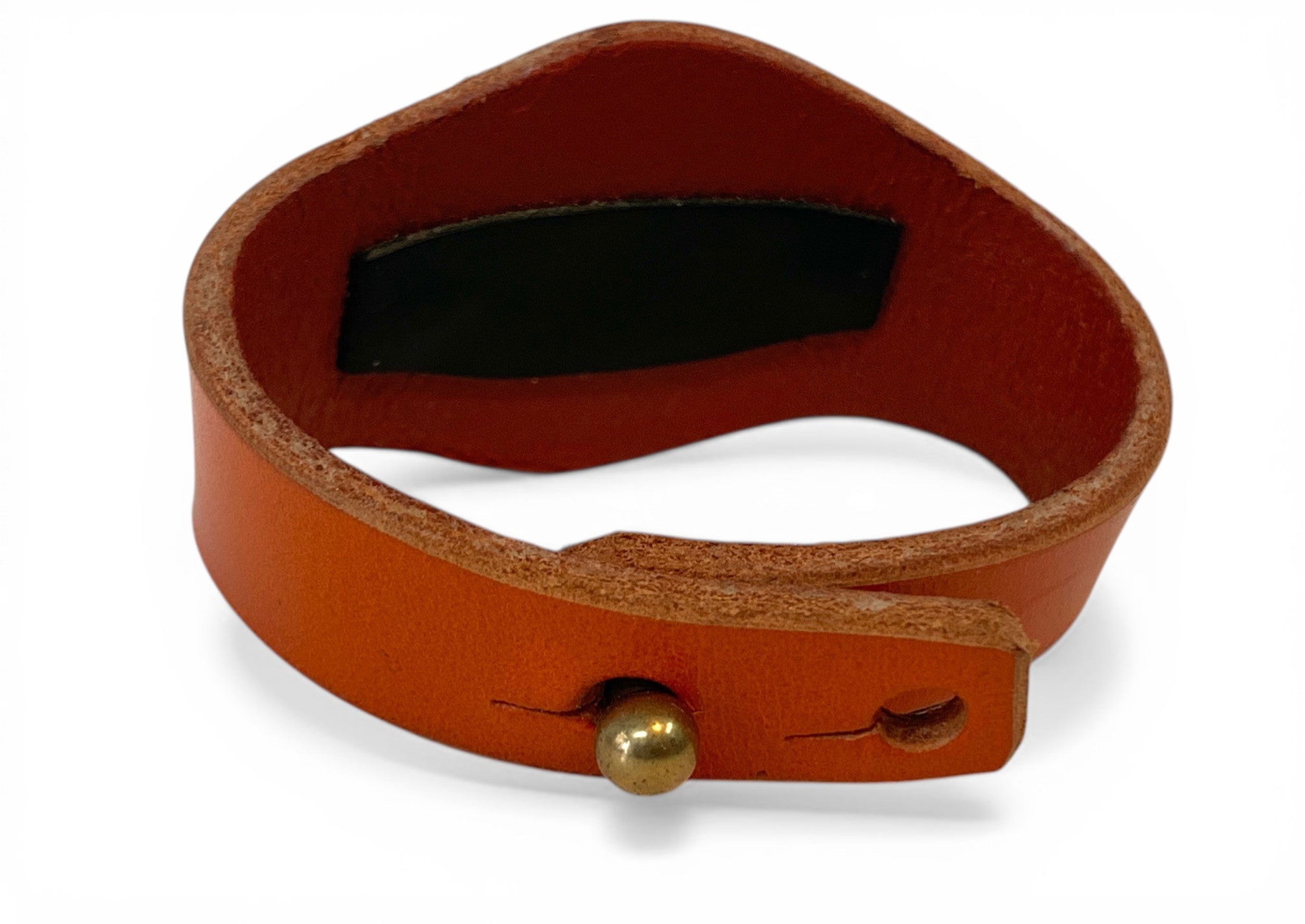 Handmade leather hand bracelet with white bronze medallion