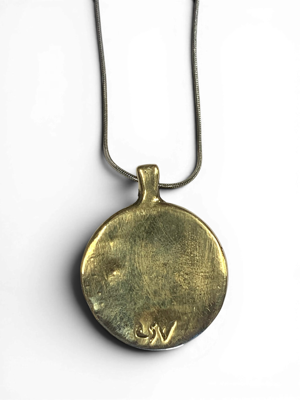 Bronze pendant with deep blue custom-made glass insert