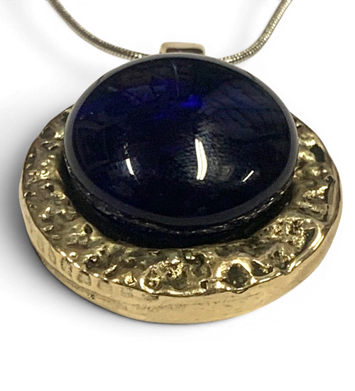 Bronze pendant with deep blue custom-made glass insert