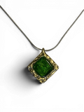 Bronze pendant with green custom-made glass insert