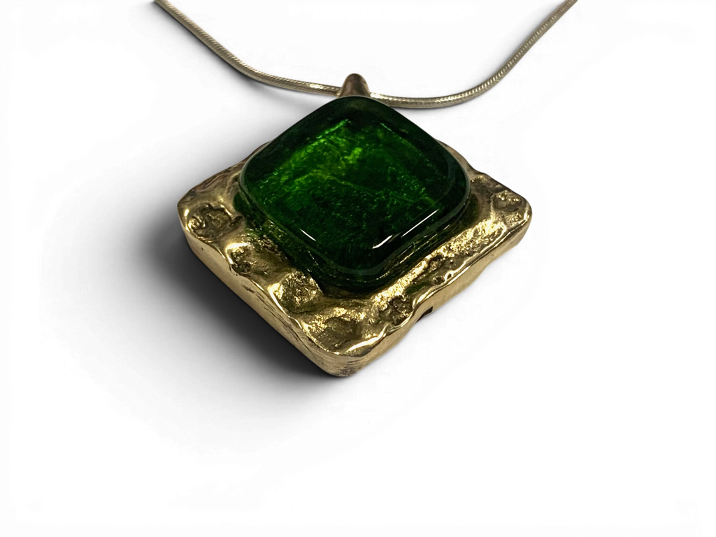 Bronze pendant with green custom-made glass insert