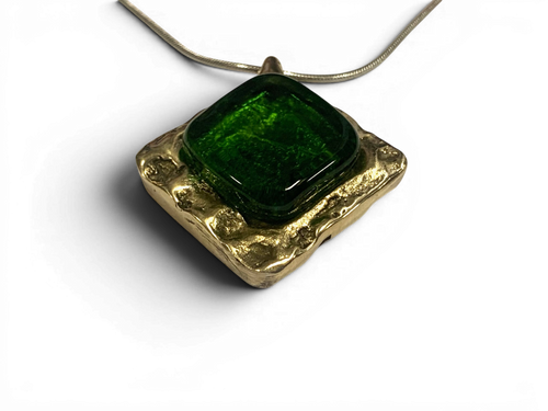 Bronze pendant with green custom-made glass insert
