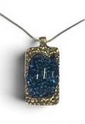Bronze pendant with transperent blue custom-made glass insert