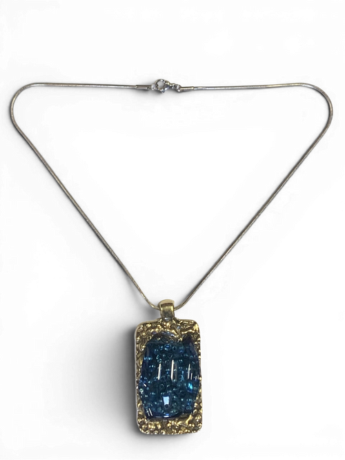 Bronze pendant with transperent blue custom-made glass insert