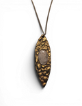 White bronze oval pendant with crystal rock insert and polish finishing.