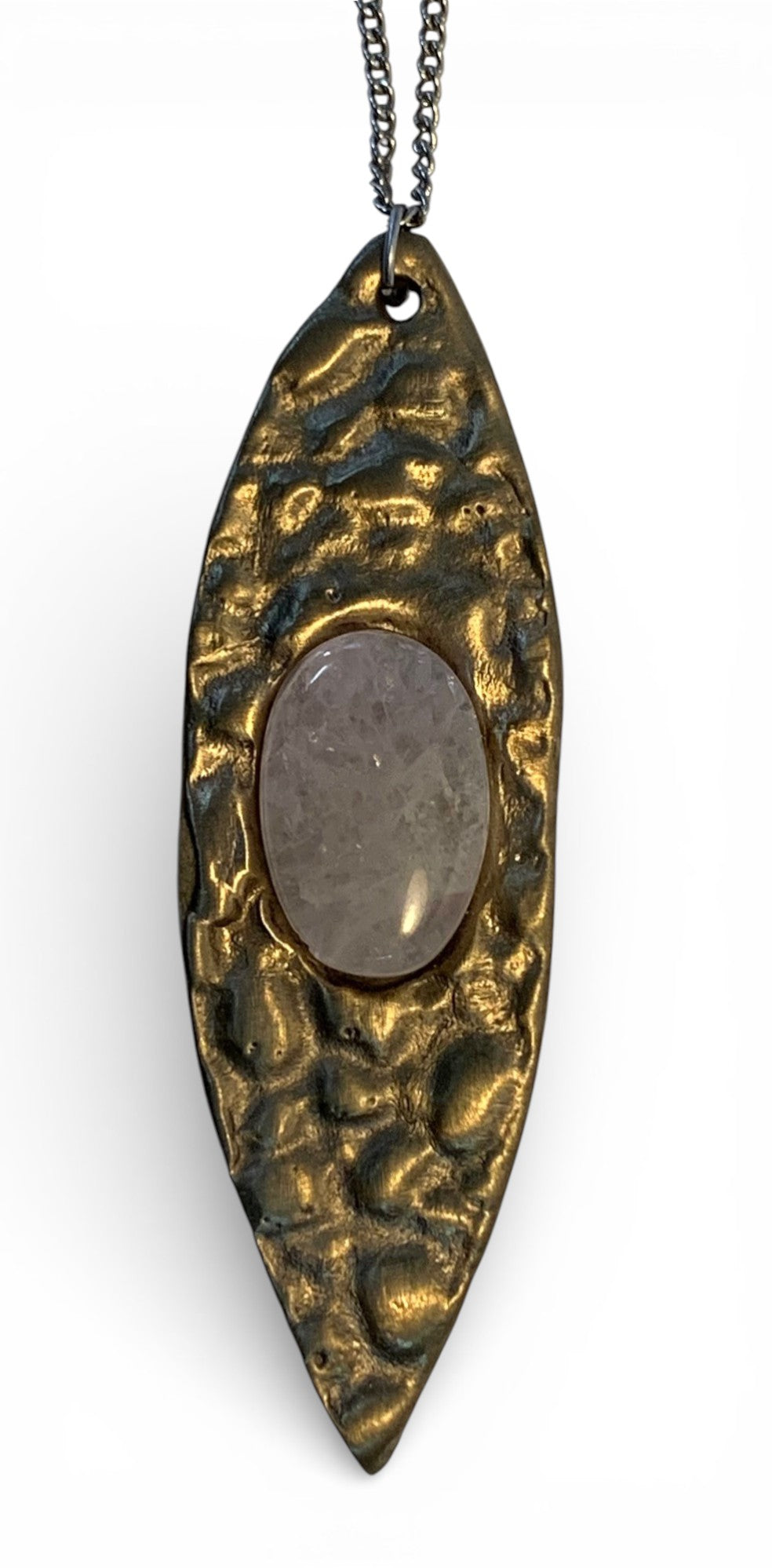 White bronze oval pendant with crystal rock insert and polish finishing.