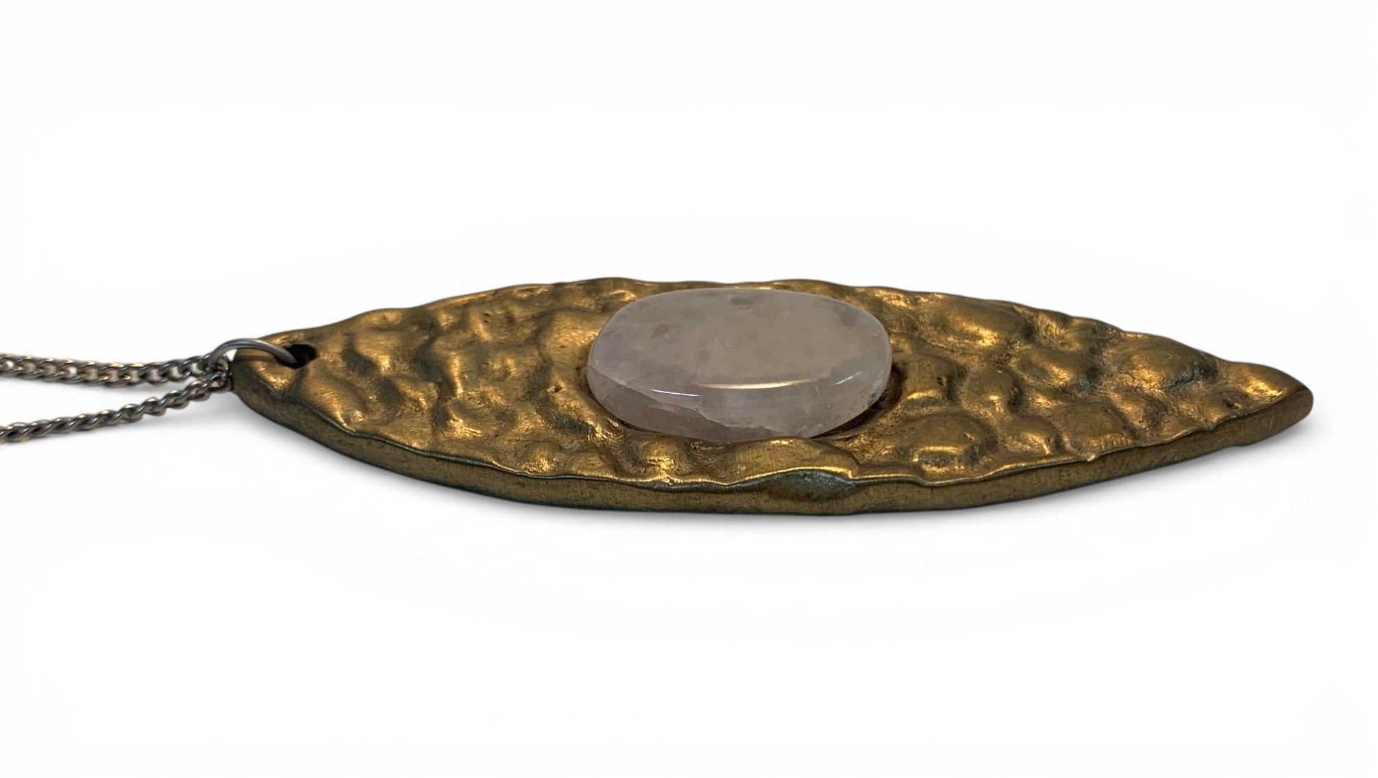 White bronze oval pendant with crystal rock insert and polish finishing.