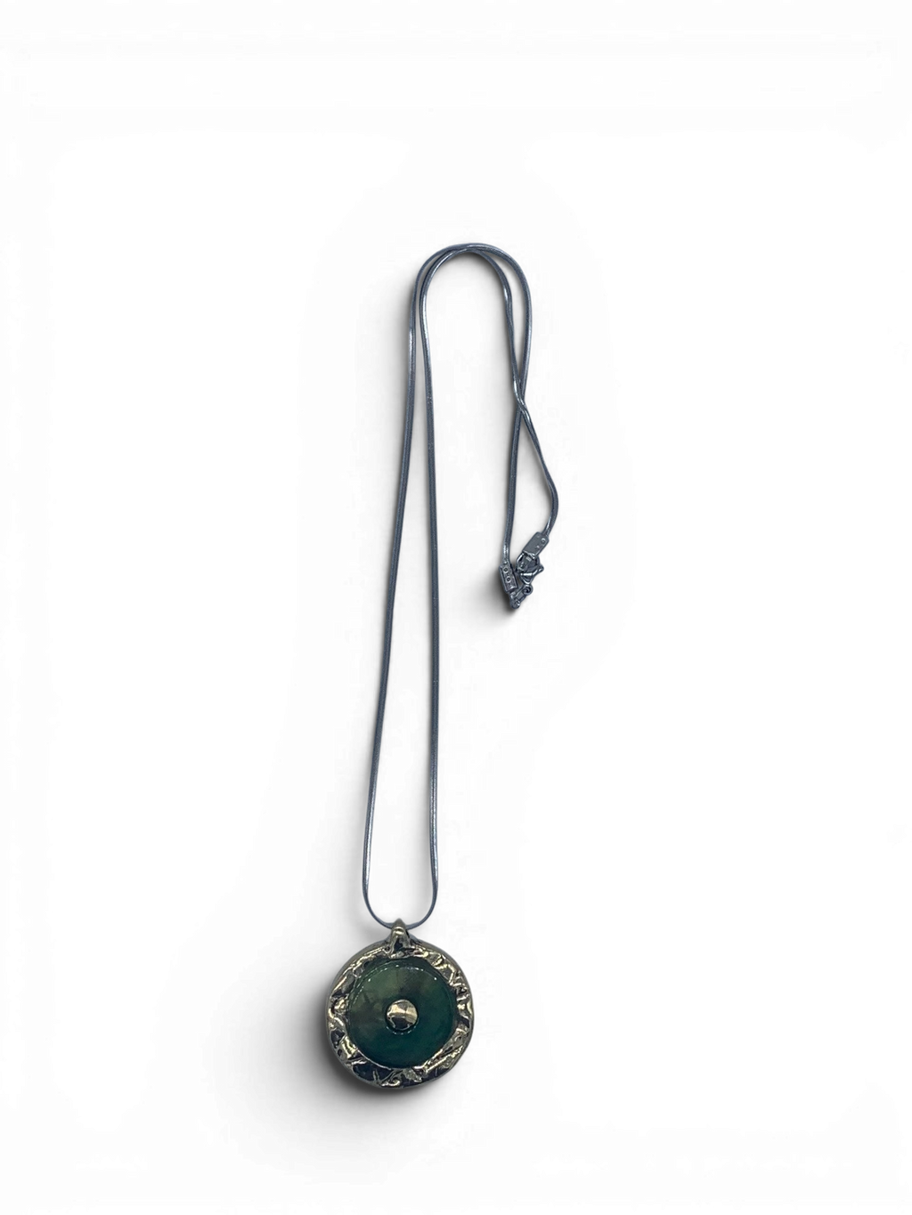 Bronze pendant with green quartz insert