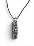 Bronze pendant with round texturized surface