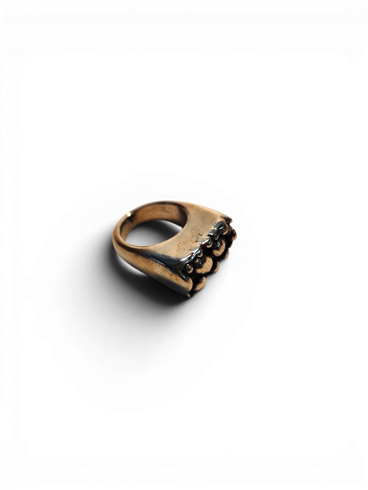 Polish bronze ring with organic round patterns