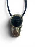 Bronze pendant with obsidian stone insert