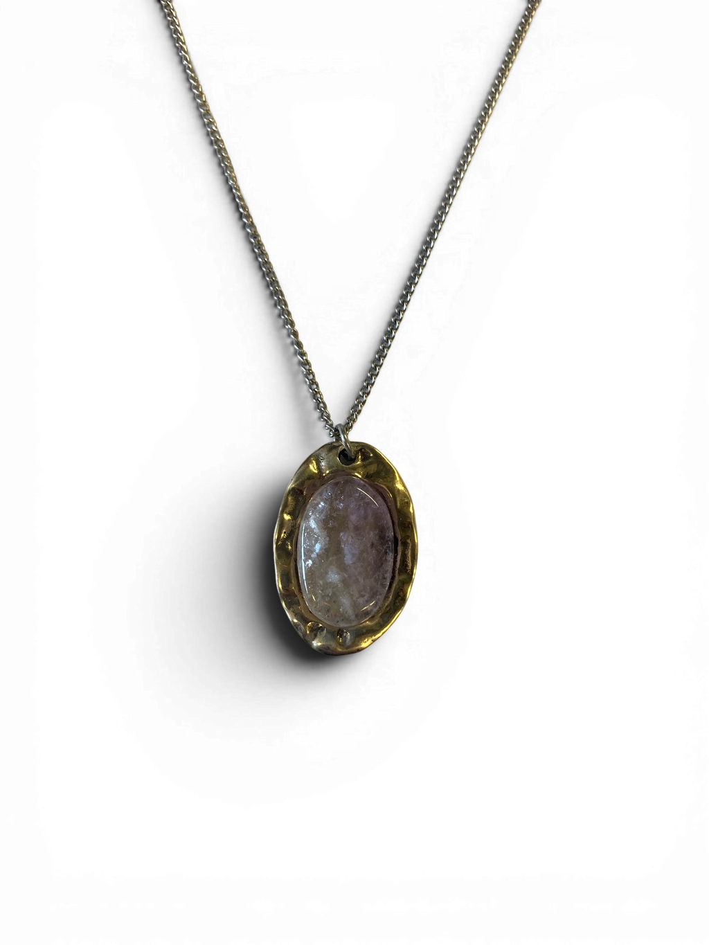 Oval bronze pendant with rock crystal insert