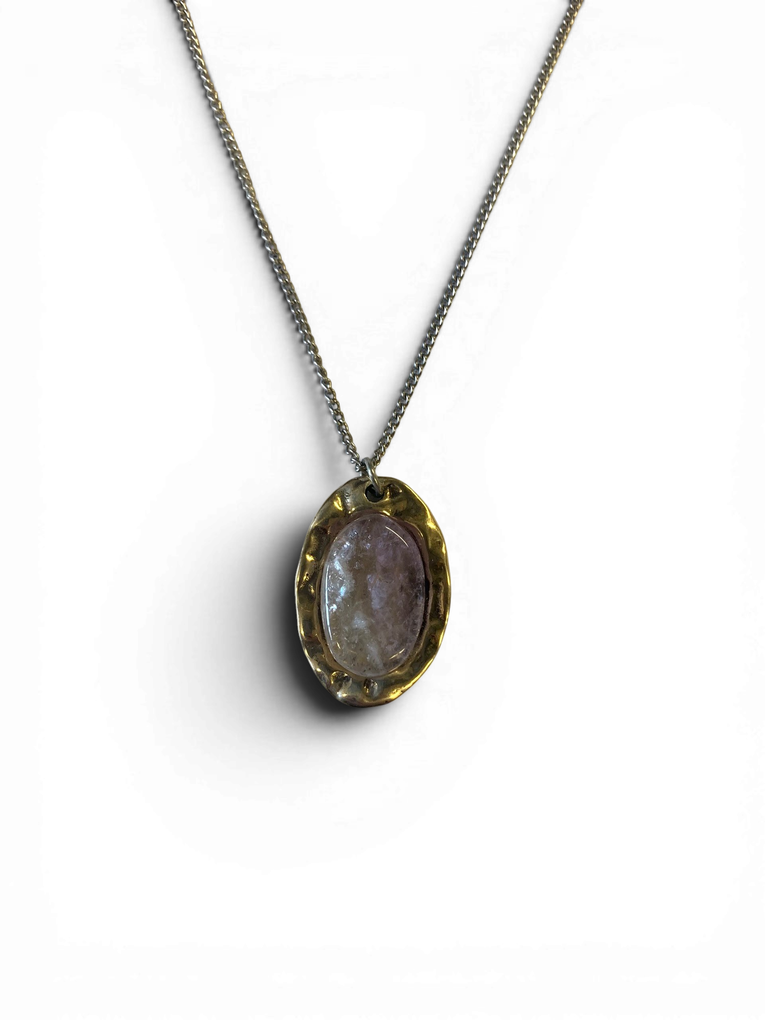 Oval bronze pendant with rock crystal insert