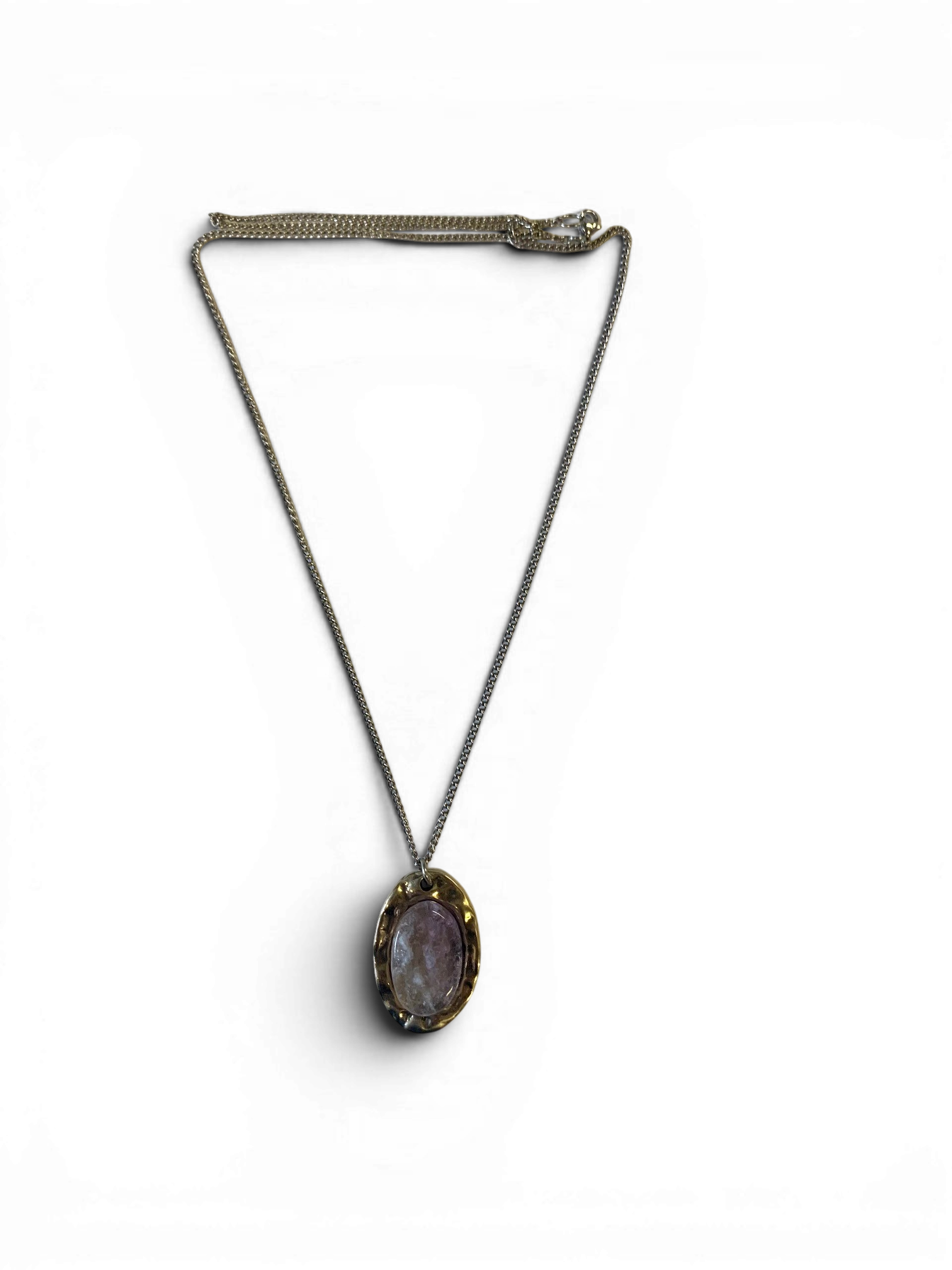 Oval bronze pendant with rock crystal insert