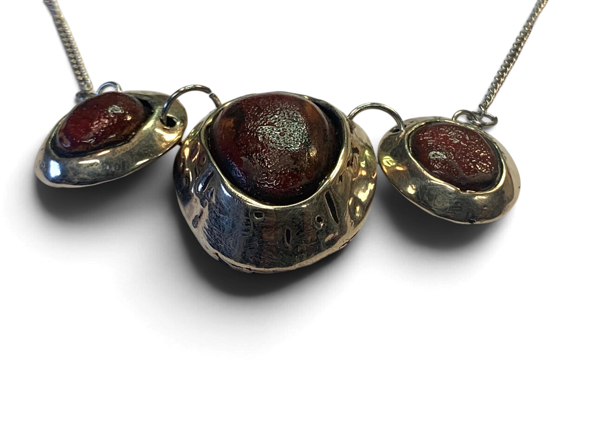 Bronze necklace with custom-made ceramic insert