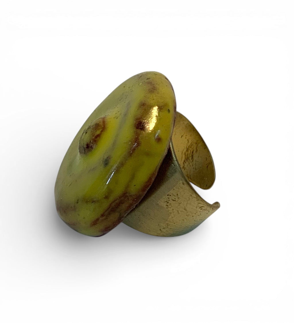 Ceramic and brass ring with green moss enamel