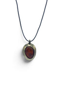 Bronze pendant with ceramic inlay