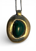 Bronze pendant with malachite stone insert and polish finishing