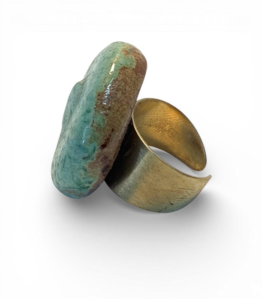 Ceramic and brass ring with cyan enamel