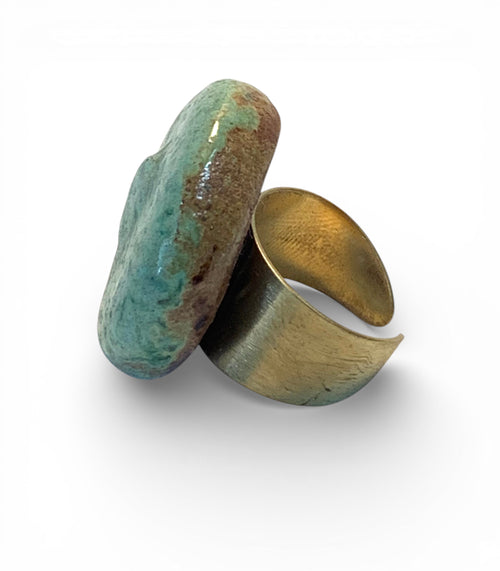 Ceramic and brass ring with cyan enamel