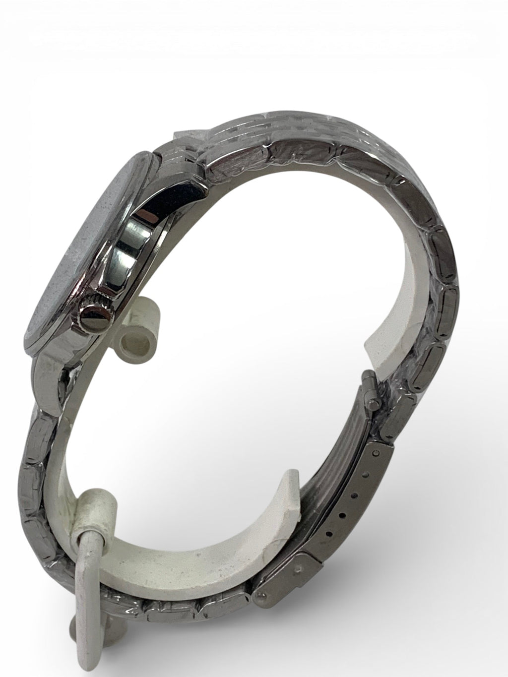 Stainless steel watch and bracelet with arabic motif background.