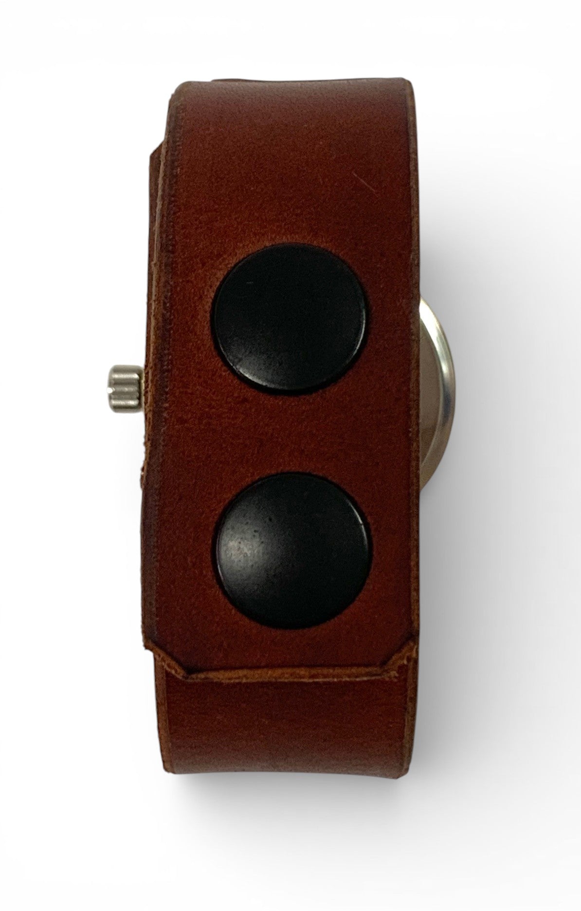 Men bronze watch with hand-made leatherr bracelet and brain design background.