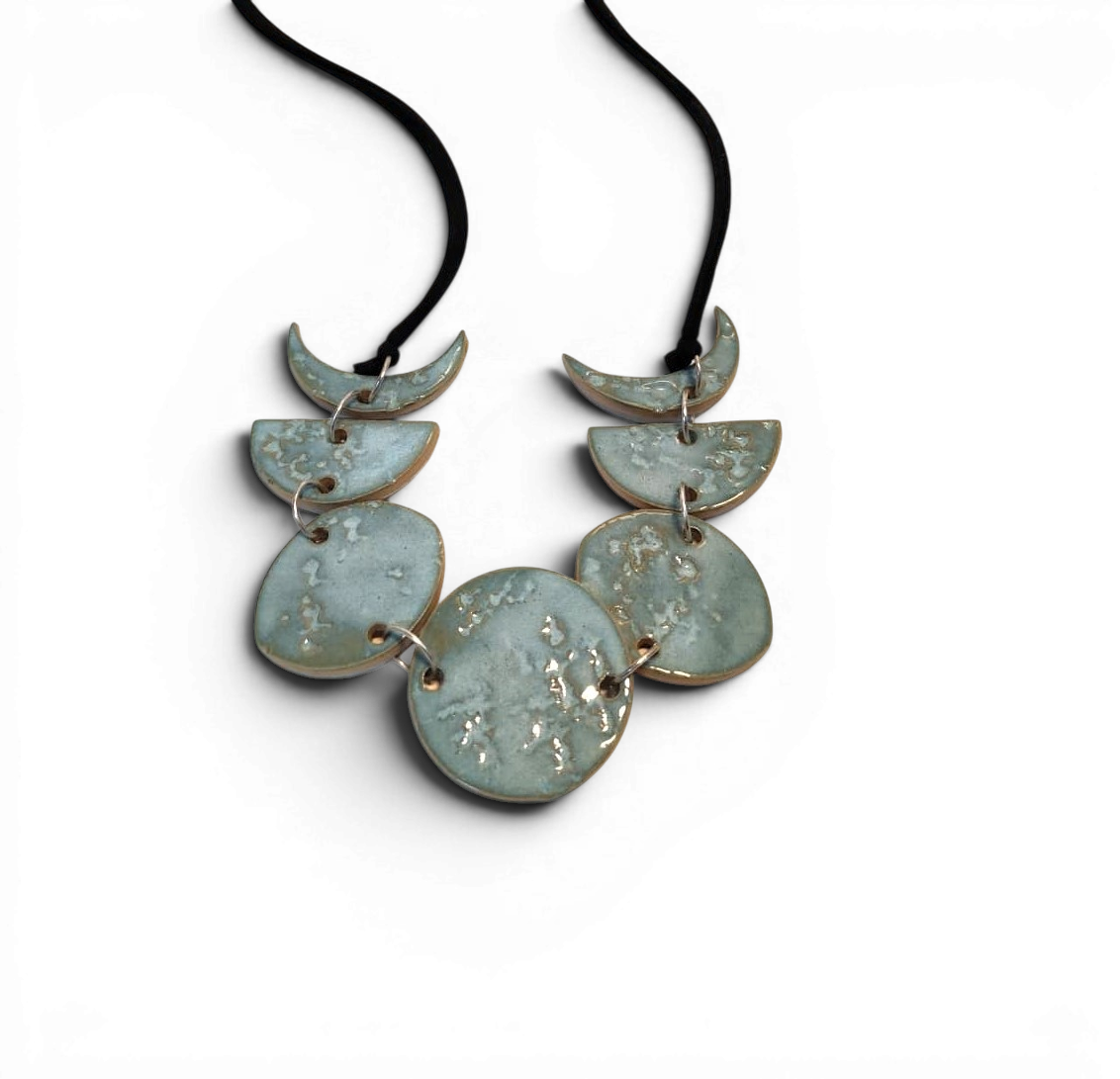Hand-made ceramic necklace with sky cyan enamel