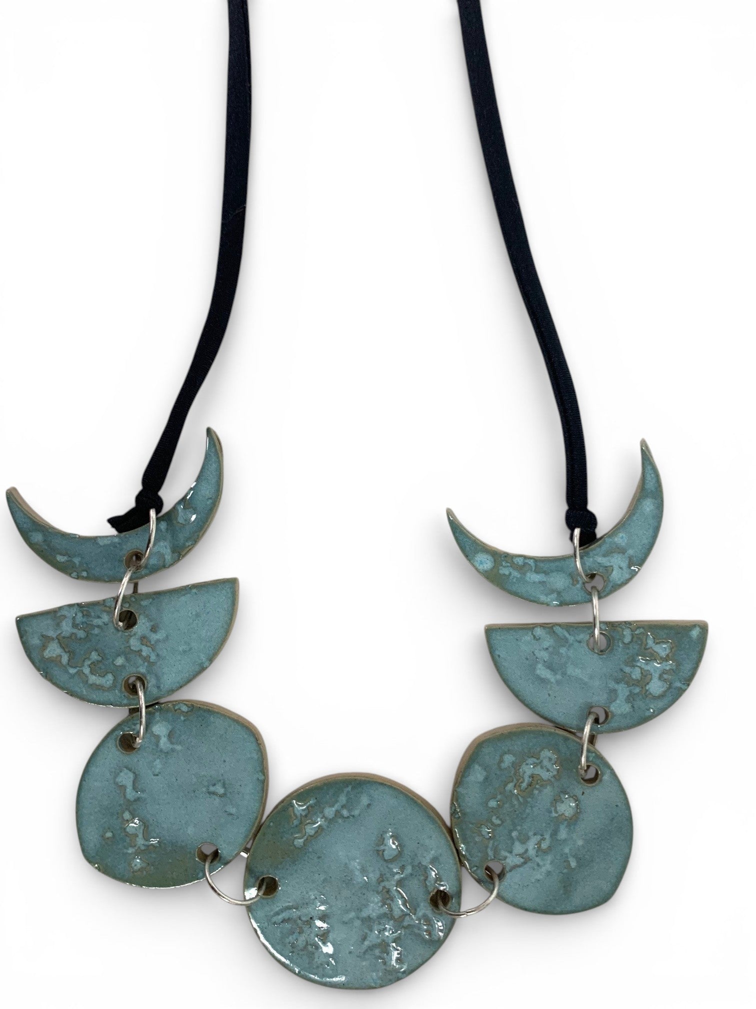 Hand-made ceramic necklace with sky cyan enamel