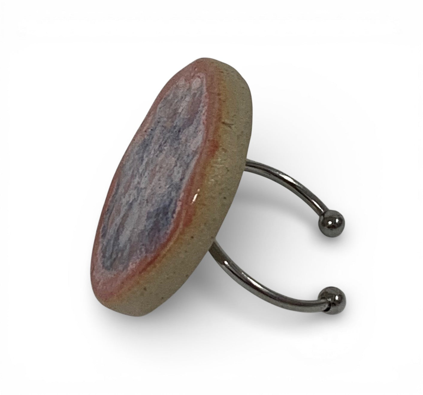 Ceramic with stainless steel ring.&nbsp;