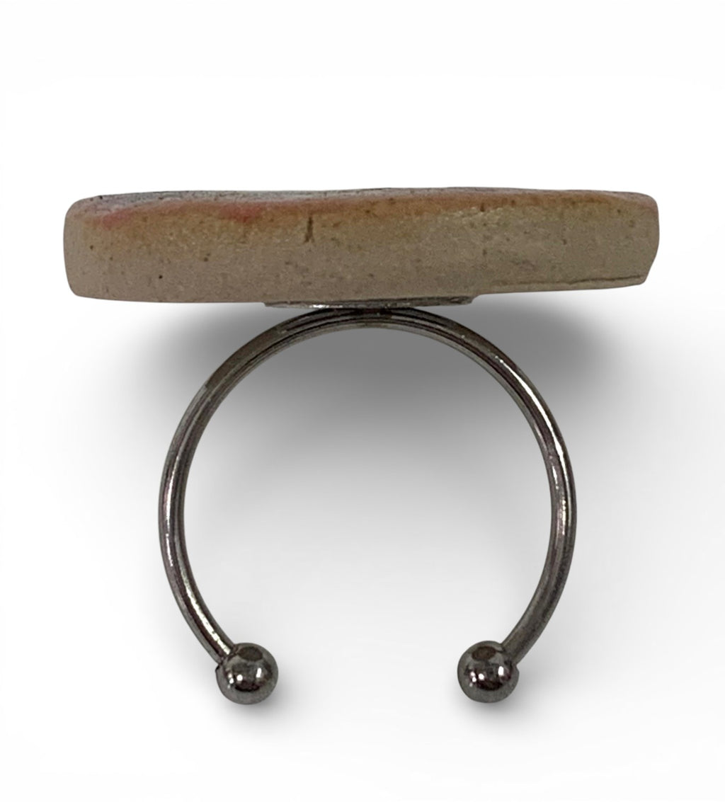Ceramic with stainless steel ring.&nbsp;