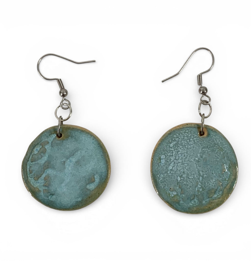 Ceramic hand-made earrings with cyan emotion enamel