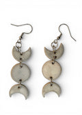 Ceramic hand-made earring with sky-white cyan enamel.