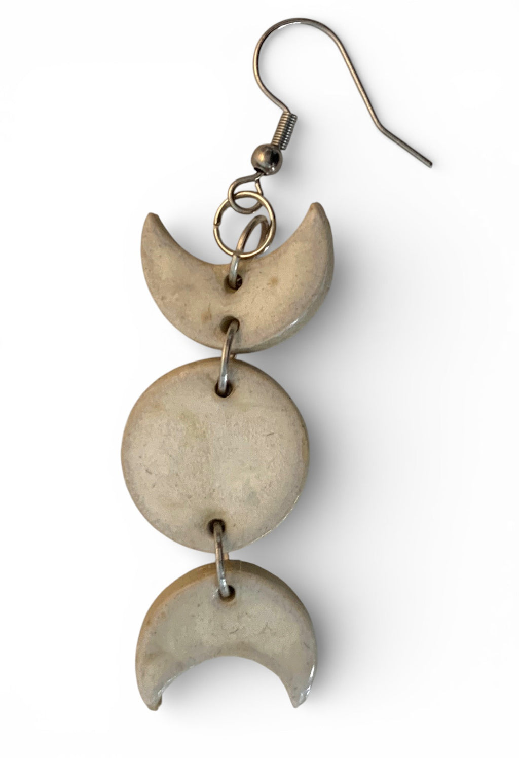 Ceramic hand-made earring with sky-white cyan enamel.