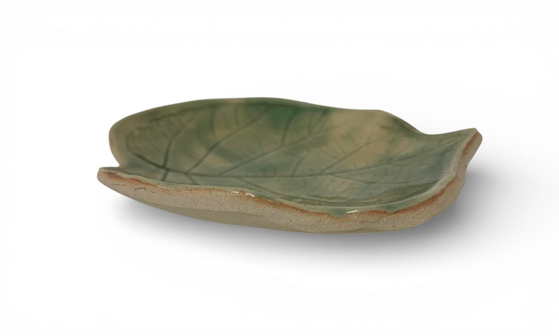 Hand-made ceramic plate with green enamel