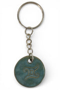 Hand-made ceramic key chain with terracotta enamel