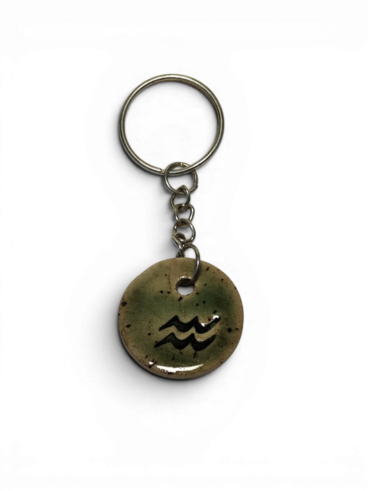 Hand-made ceramic key chain with enamel and sodiac symbols