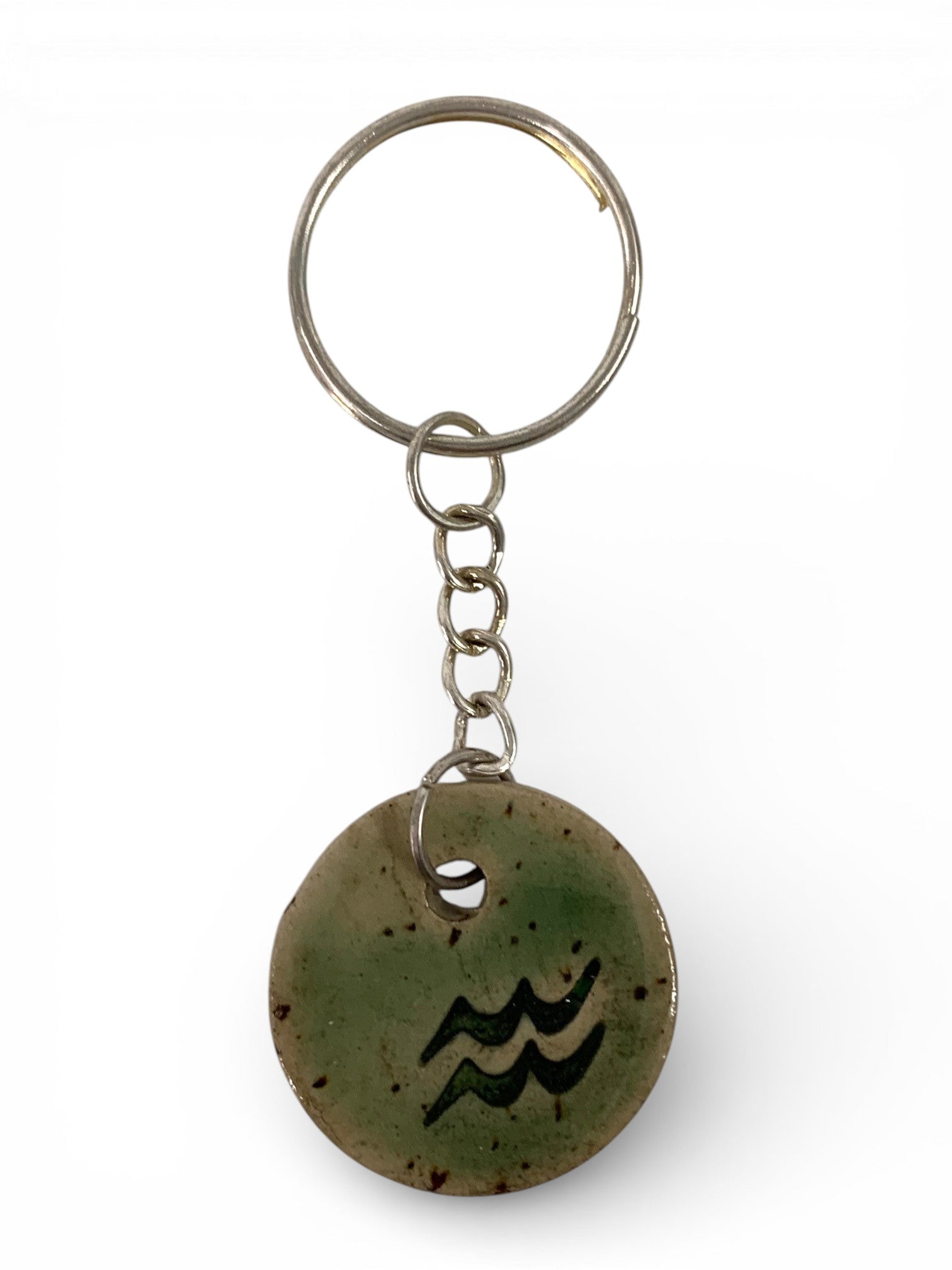 Hand-made ceramic key chain with enamel and sodiac symbols