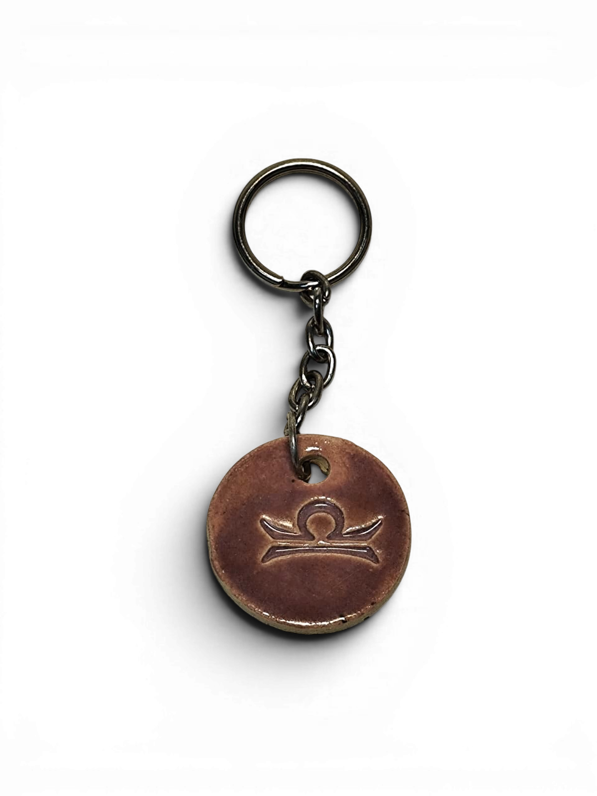 Hand-made ceramic key chain with zodiac symbol