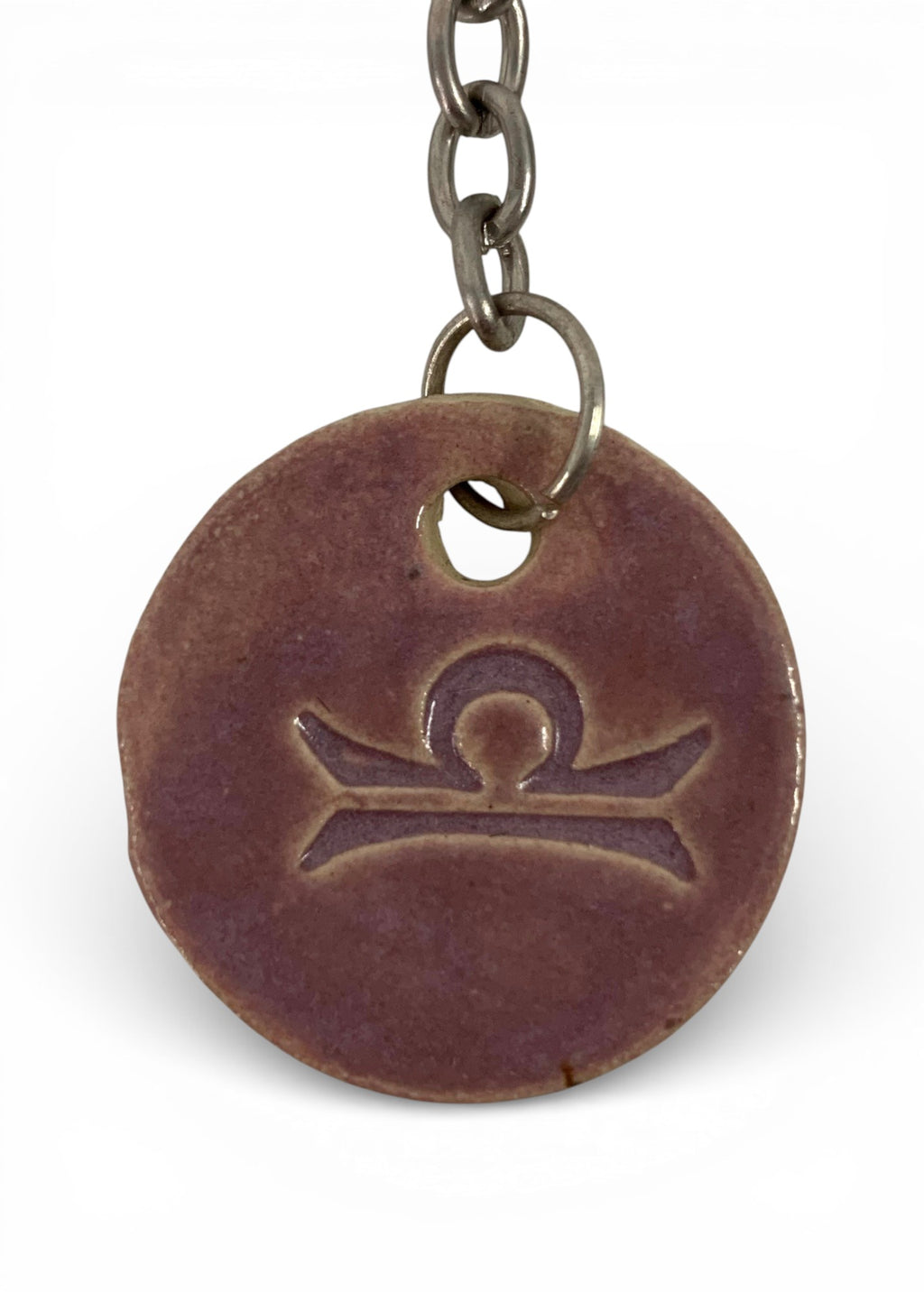 Hand-made ceramic key chain with zodiac symbol