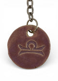 Hand-made ceramic key chain with zodiac symbol