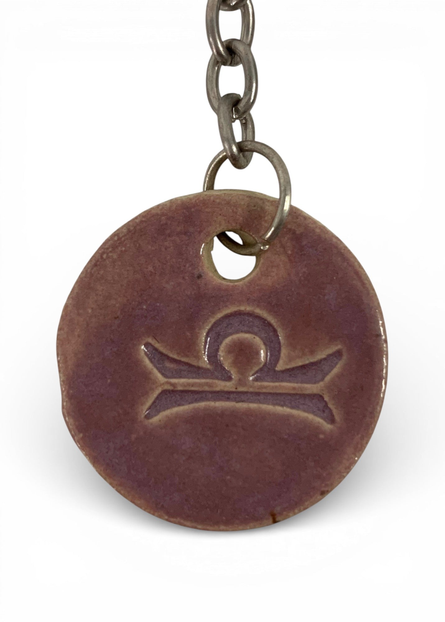 Hand-made ceramic key chain with zodiac symbol