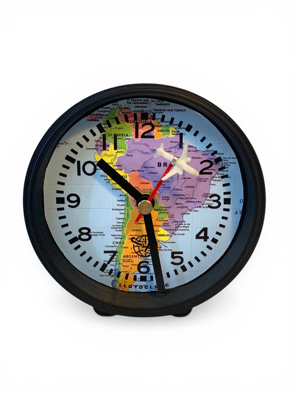 Table clock with travelling design background