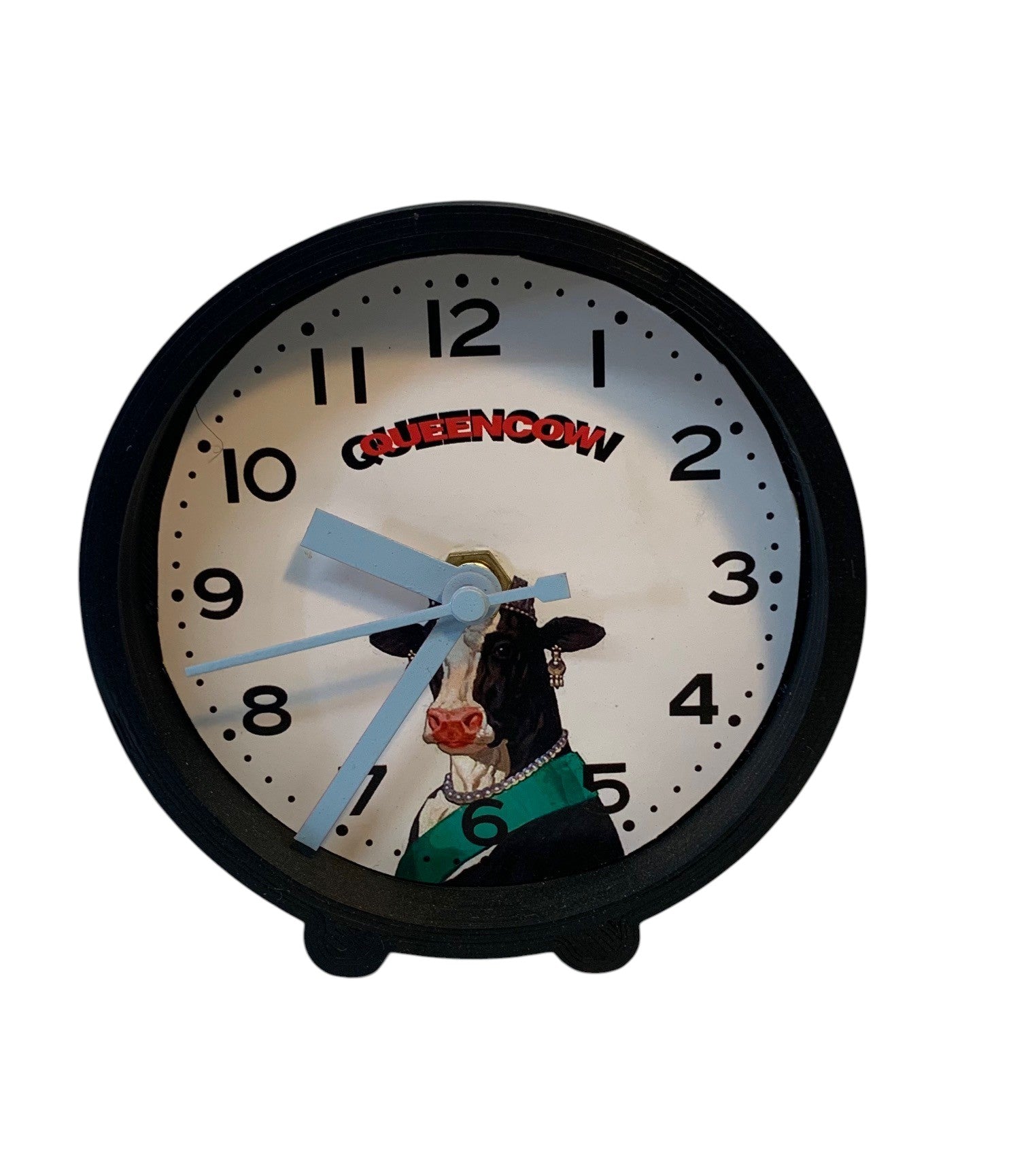 Table clock with cow design background