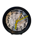Table clock with geometric human figures and reverse movement