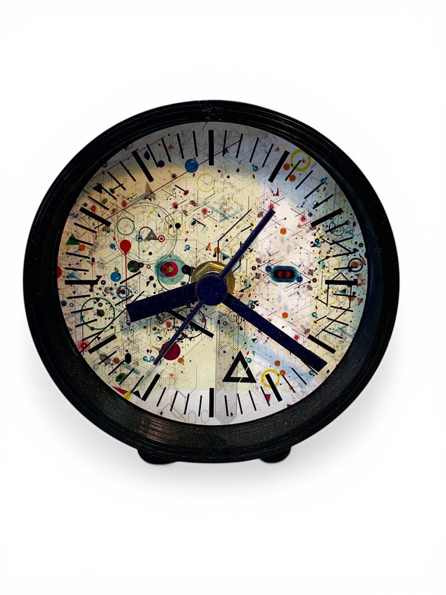 Table clock with colorful abstract design background
