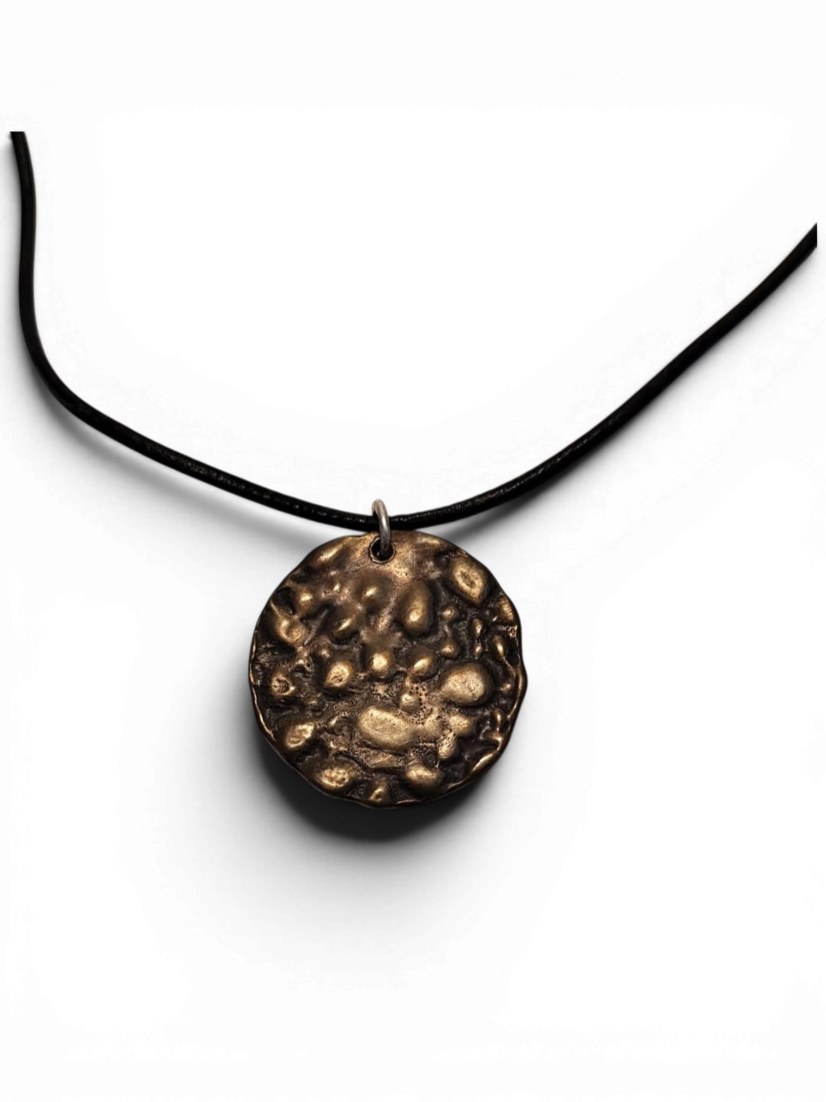 Bronze pendant with polish finishing and leather chain