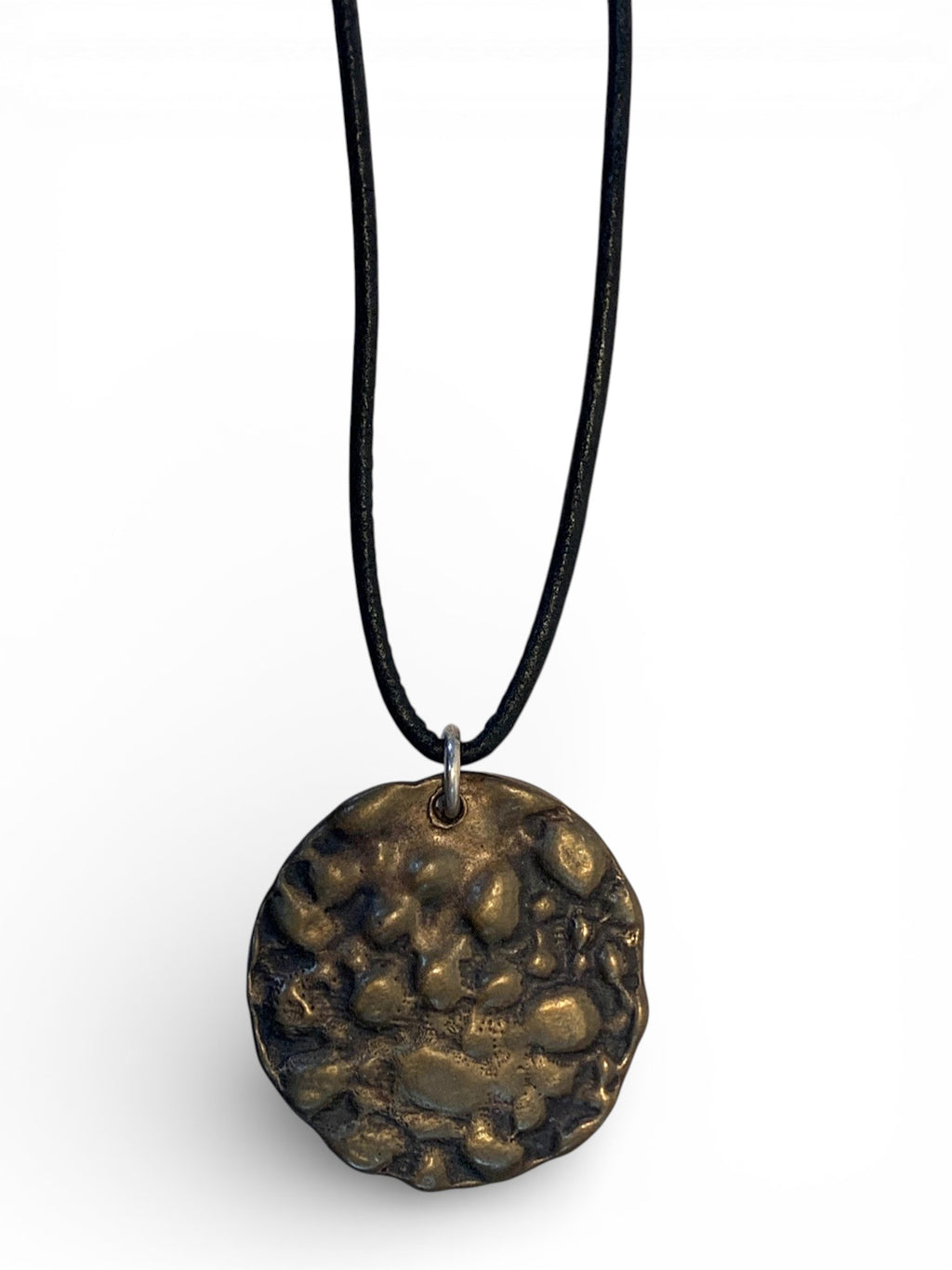 Bronze pendant with polish finishing and leather chain