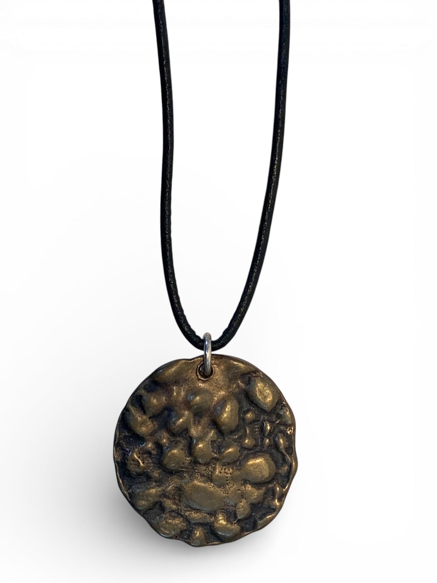 Bronze pendant with polish finishing and leather chain