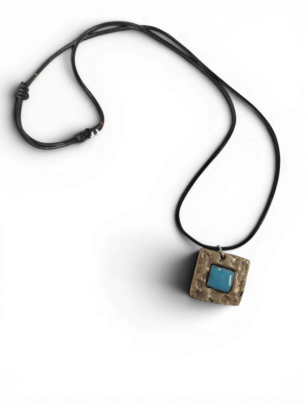 Bronze pendant with custom-made ceramic insert and leather chain