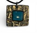 Bronze pendant with custom-made ceramic insert and leather chain